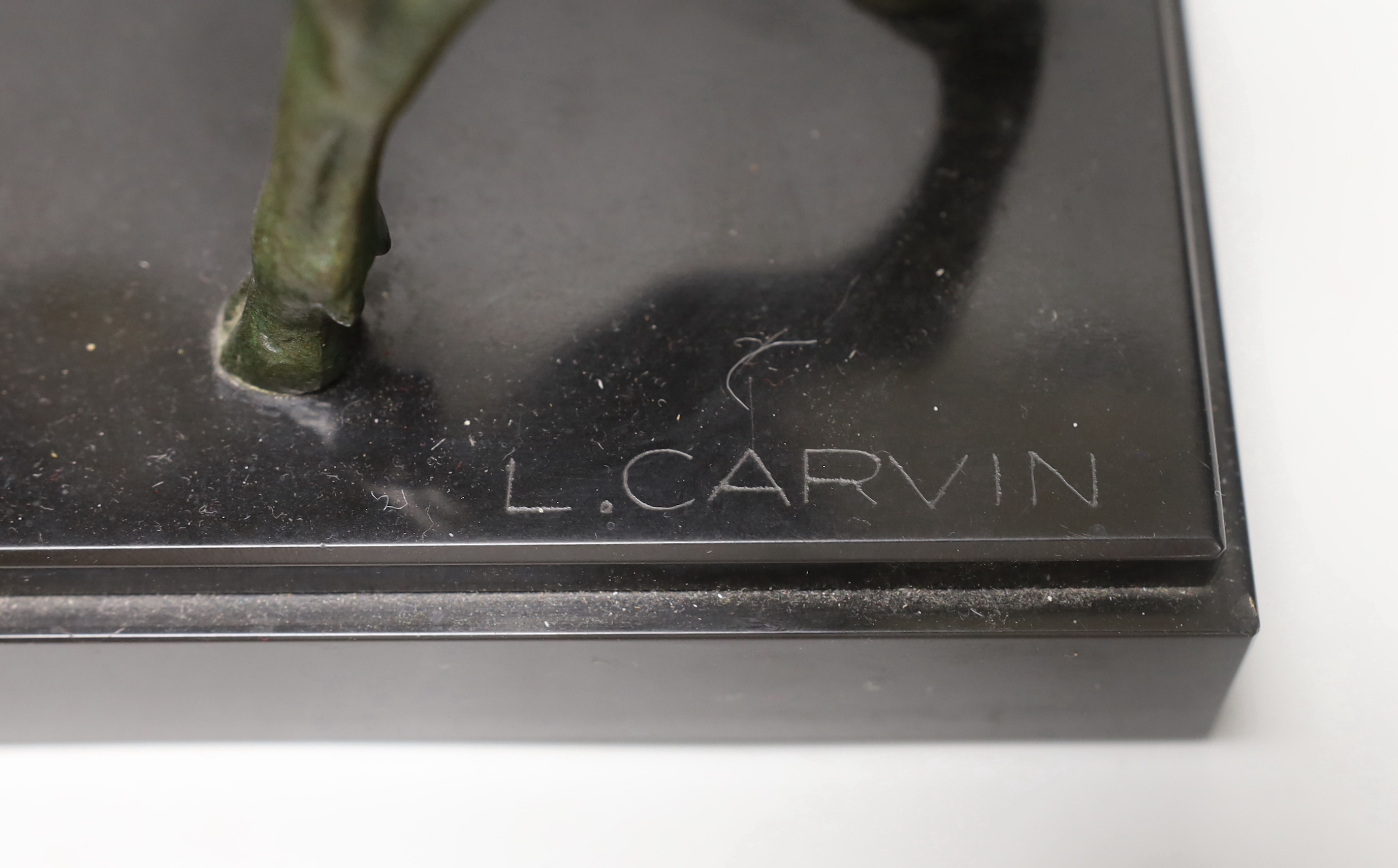 After Louis-Albert Carvin (1875–1951). A spelter group of a stag and faun, signed to base. 41cm tall